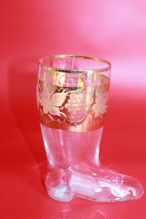 Gold-trimmed glass drinking boot