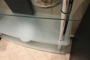 Chrome & glass wall shelving unit