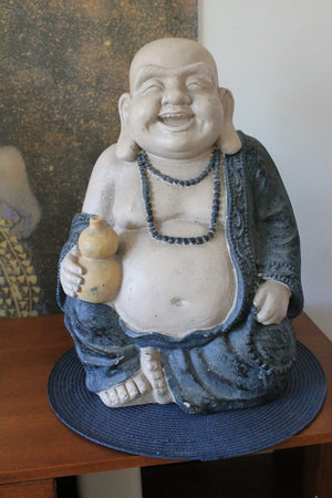 Smiling Buddha statue