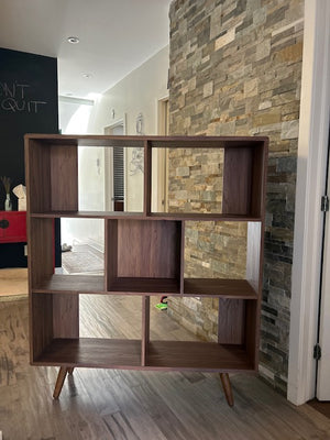 Three-tiered MCM bookshelves