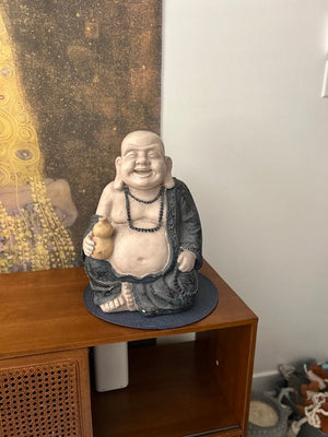 Smiling Buddha statue